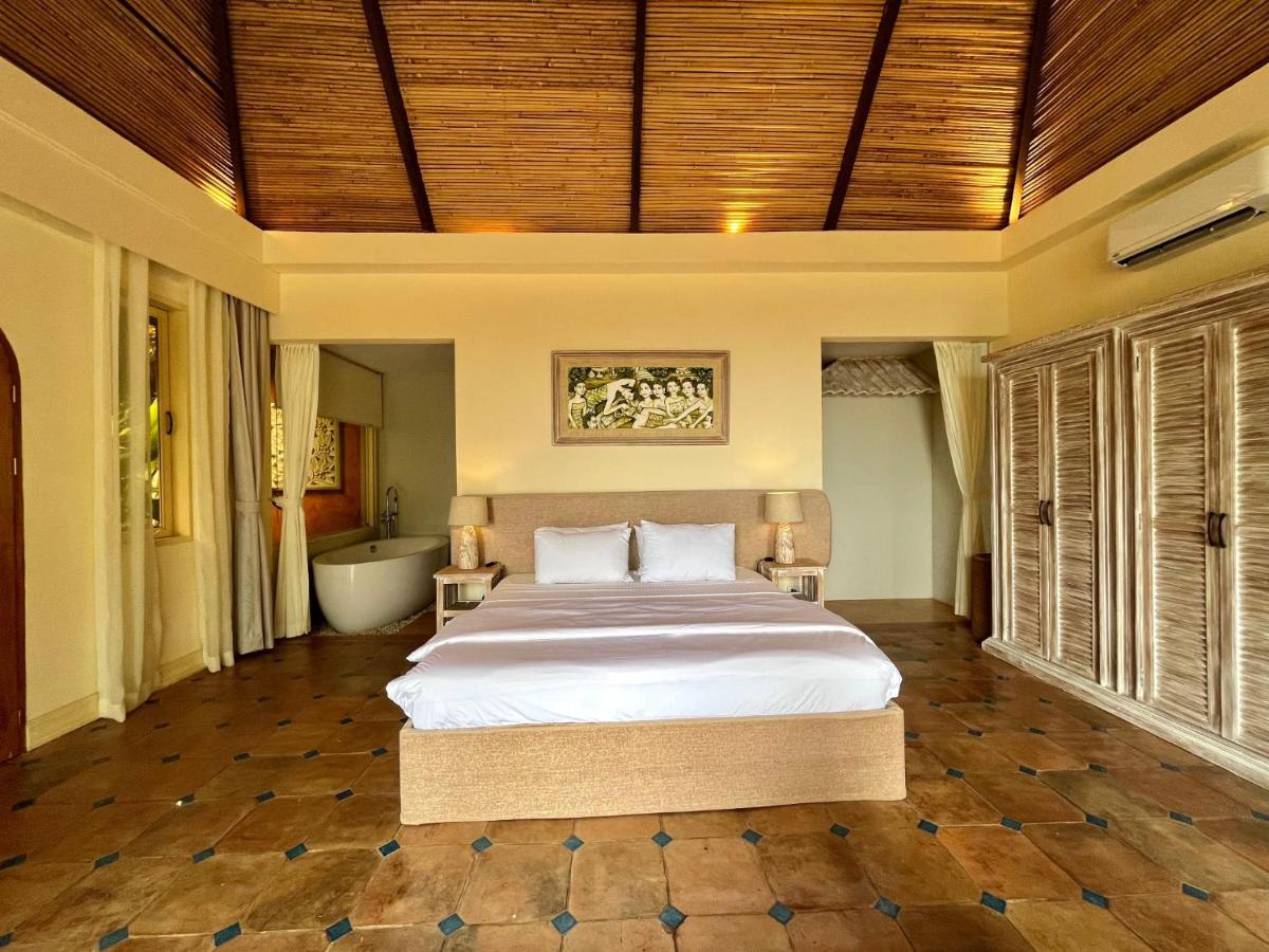Coco Grove Beach Resort, Siquijor Island Zewnętrze zdjęcie A bedroom at the resort