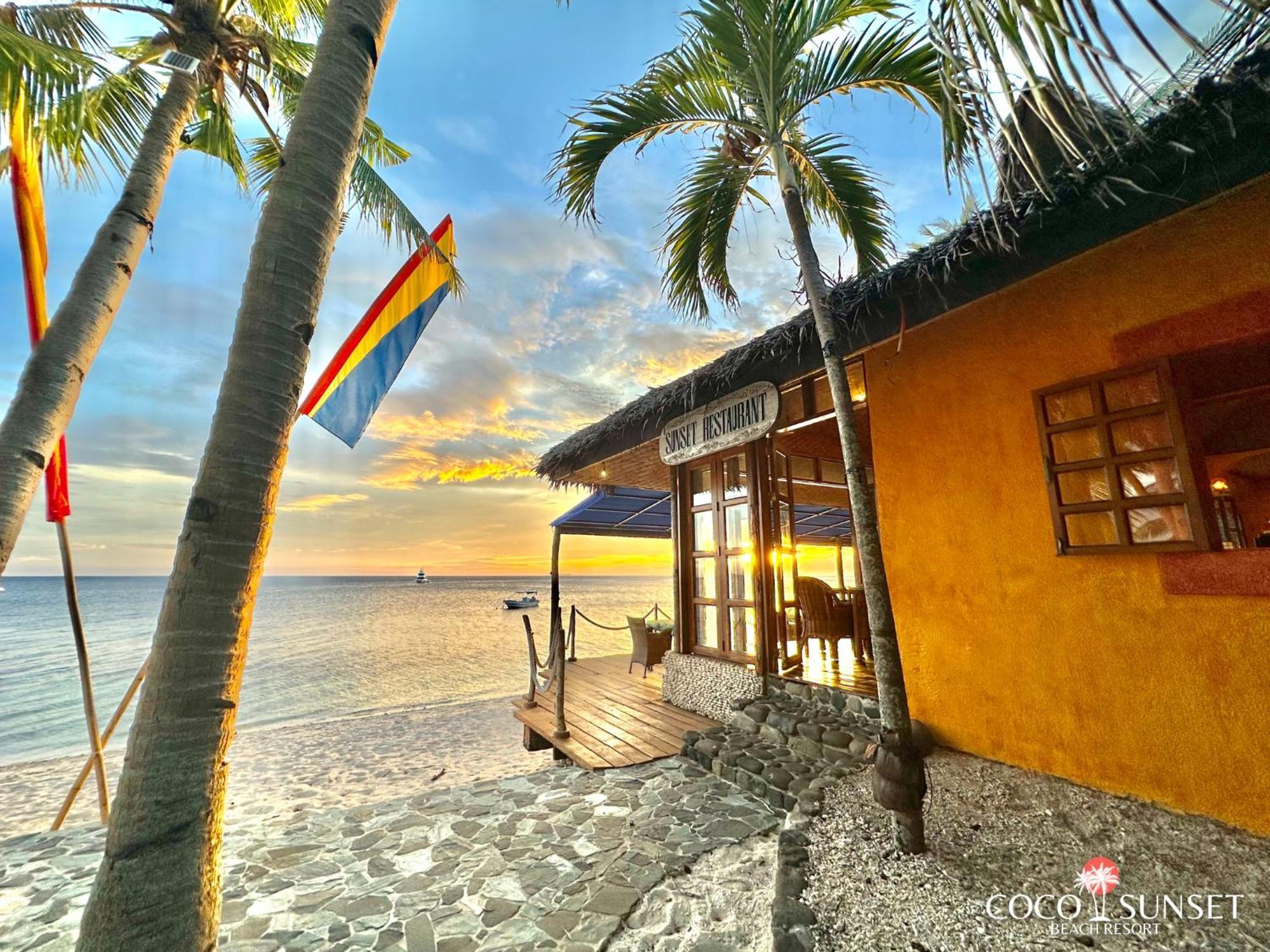 Coco Grove Beach Resort, Siquijor Island Zewnętrze zdjęcie Sunset at the beach